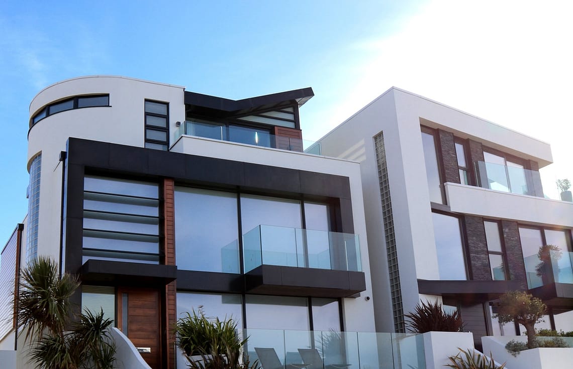 a modern house with transparent glass windows
