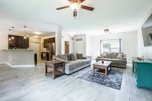 a spacious living room with furniture