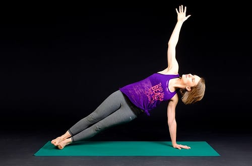 Side planking woman