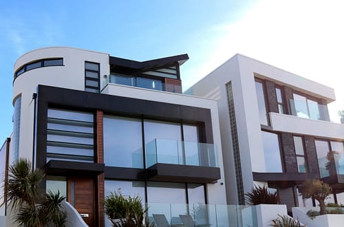 a modern house with transparent glass windows