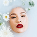 a white face and red lips